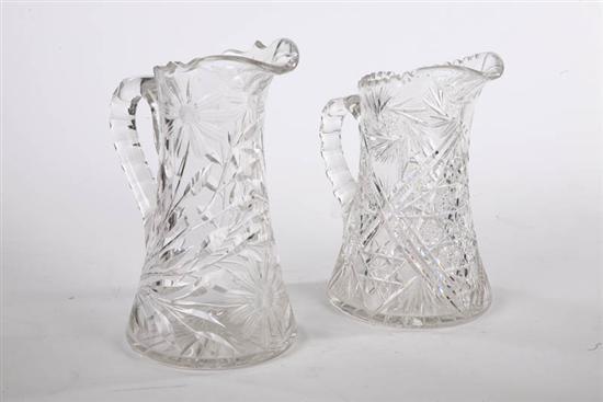 Appraisal: TWO CUT GLASS WATER PITCHERS One with daisies marked Fry