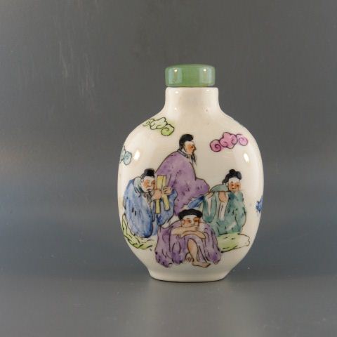 Appraisal: Chinese Porcelain Snuff Bottle seated figurines on each side signed