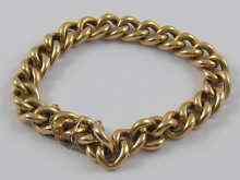 Appraisal: A yellow metal tests ct gold curb link bracelet with