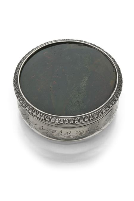 Appraisal: A table snuff box unmarked of circular outline the base