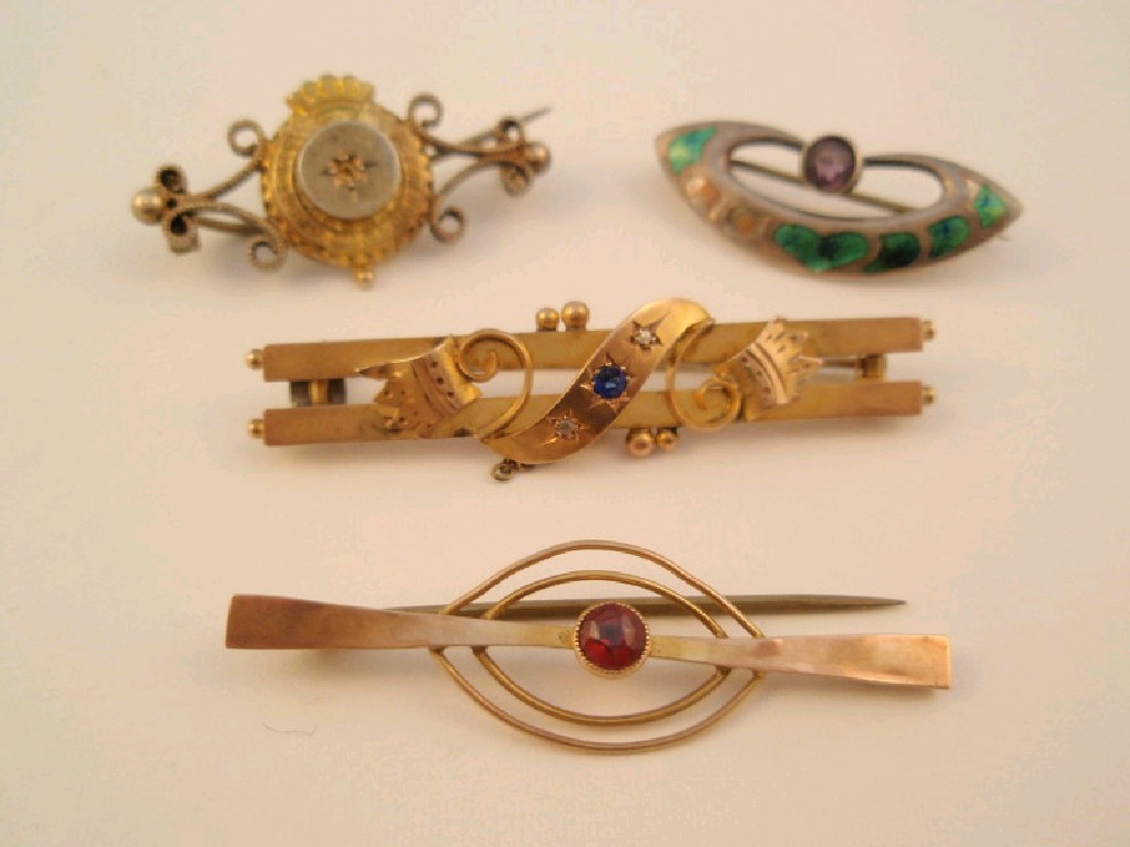 Appraisal: Four small Victorian brooches including one by Charles Horner but