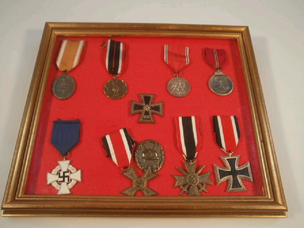 Appraisal: A German military medal collection comprising two Iron Crosses Long