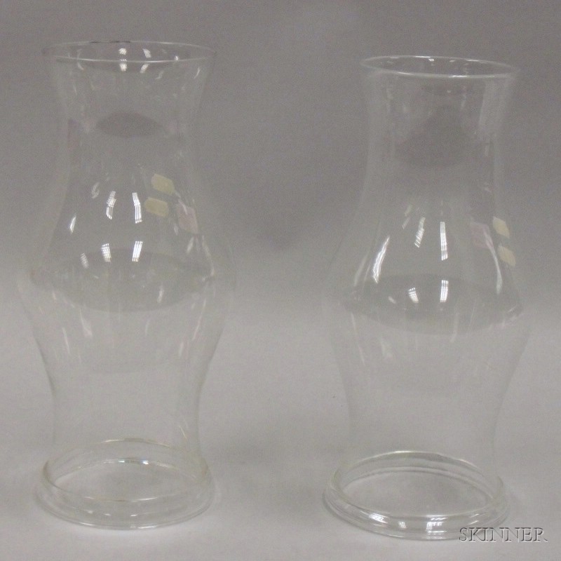 Appraisal: Pair of Colorless Blown Glass Hurricane Shades with Folded Rim