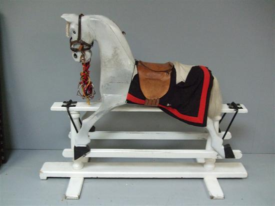 Appraisal: White painted rocking horse th century h in