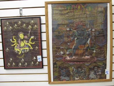 Appraisal: TWO TIBETAN NEPALESE THANKA TANKA paintings on cloth each featuring