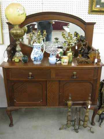 Appraisal: Mahogany Server oval mirrored back two drawer over double doors