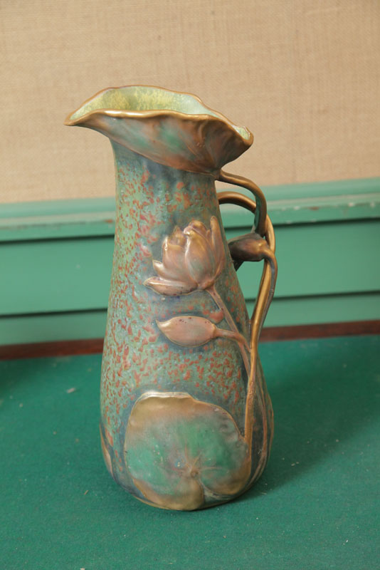 Appraisal: AMPHORA PITCHER Mottled green and brown surface with gilted and