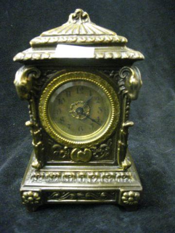 Appraisal: Mantle or Desk Clock bronzed case ram's head decor x