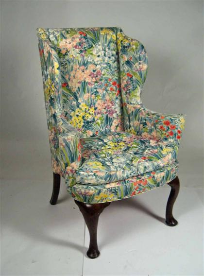 Appraisal: George I walnut wingback armchair th century The floral upholstered