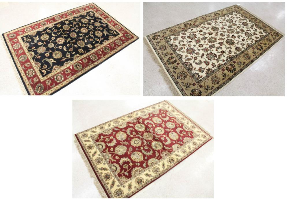 Appraisal: THREE HAND KNOTTED ORIENTAL AREA RUGS Indo-Persian similar floral patterns