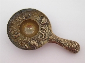 Appraisal: A German silver tea-strainer Hanau circa embossed in relief with