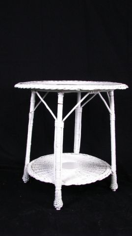 Appraisal: White painted antique wicker large round table diameter with lower