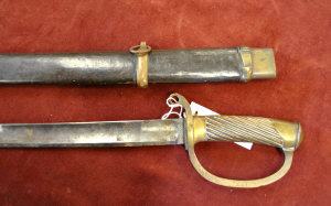 Appraisal: A Russian military sword with slightly curved and fullered cm