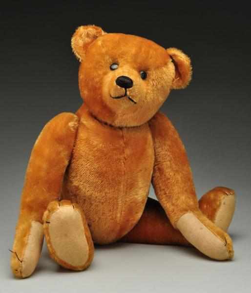 Appraisal: Early American Golden Mohair Bear Description Circa Shoe button eyes