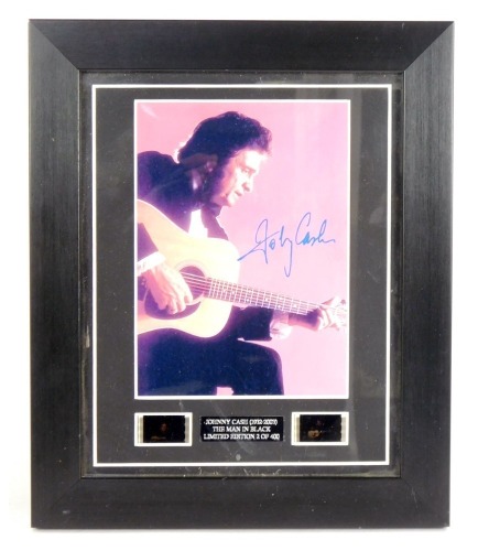 Appraisal: Johnny Cash - The Man in Black photograph with printed