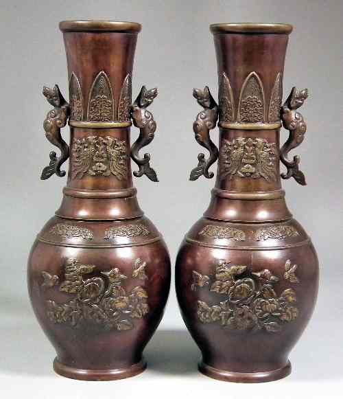 Appraisal: A pair of th Century Chinese brown patinated bronze two-handled