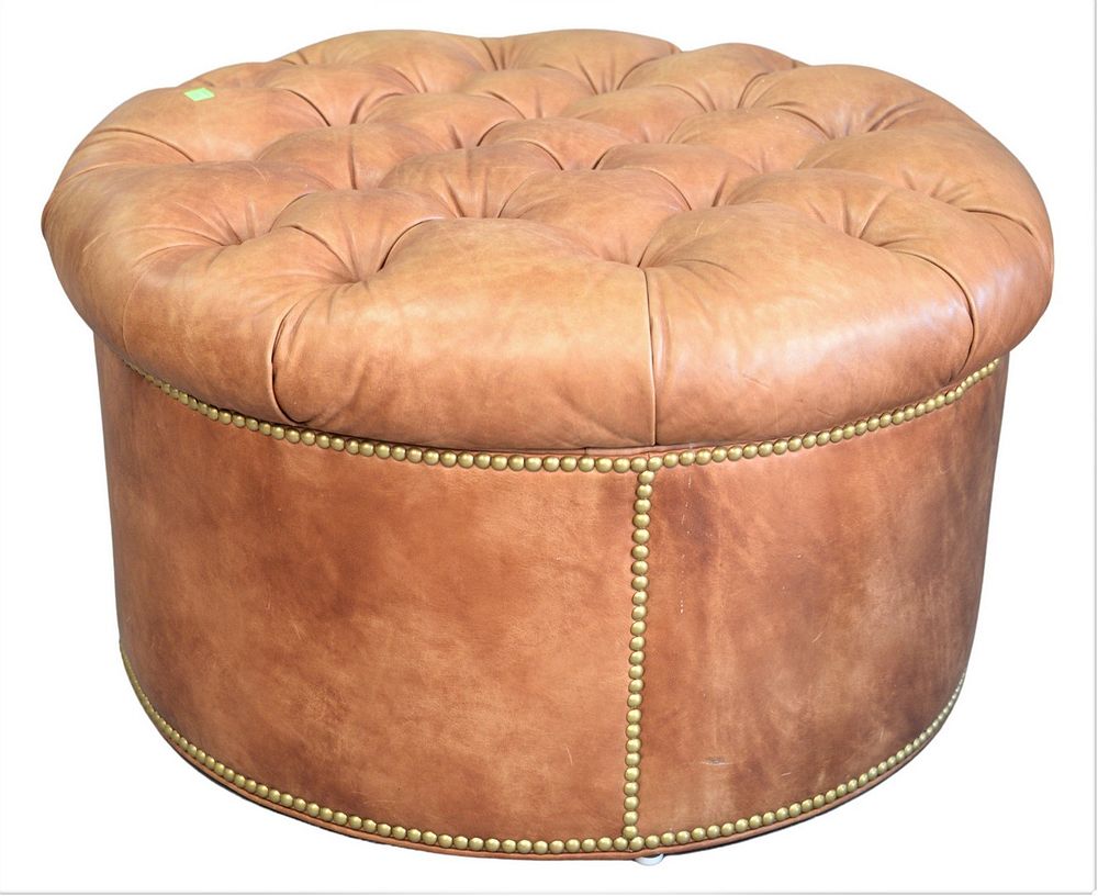 Appraisal: O Henry House Round Pouf having tufted brown leather and