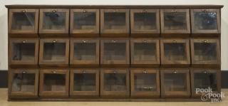 Appraisal: Oak country store seed counter ca with twenty-one drawers and