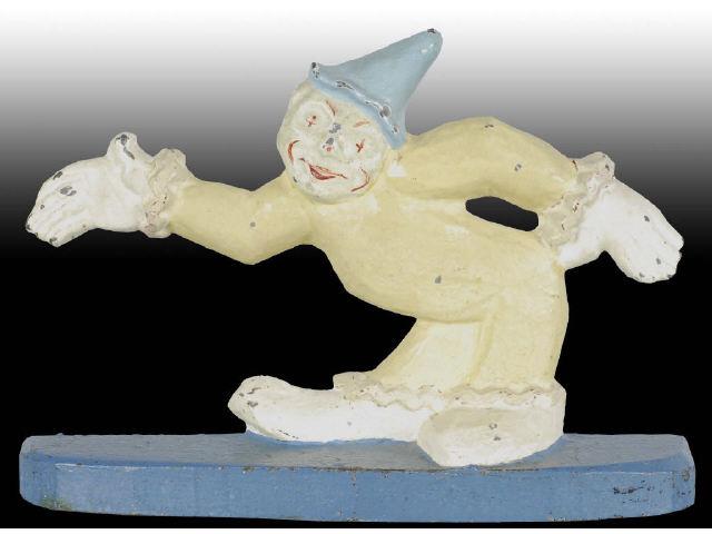 Appraisal: Clown with Out Stretched Arms Cast Iron Doorstop Description Fantastic