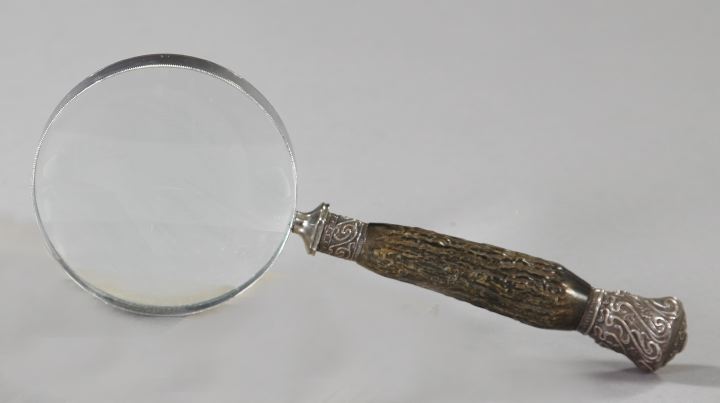 Appraisal: Edwardian Silver-Mounted Black Horn Desk Magnifier first quarter th century