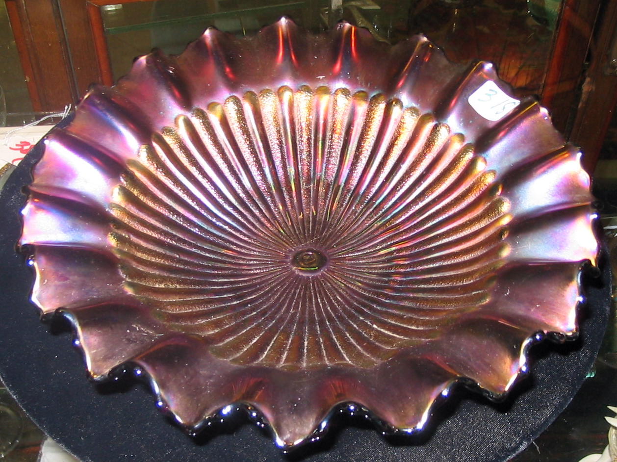 Appraisal: AN AMERICAN NORTHWOOD CARNIVAL GLASS BOWL in an iridescent amethyst