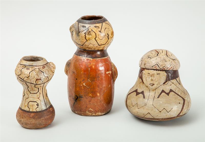 Appraisal: THREE AMAZONIAN PAINTED POTTERY FIGURAL VESSELS Shipibo Peru the largest