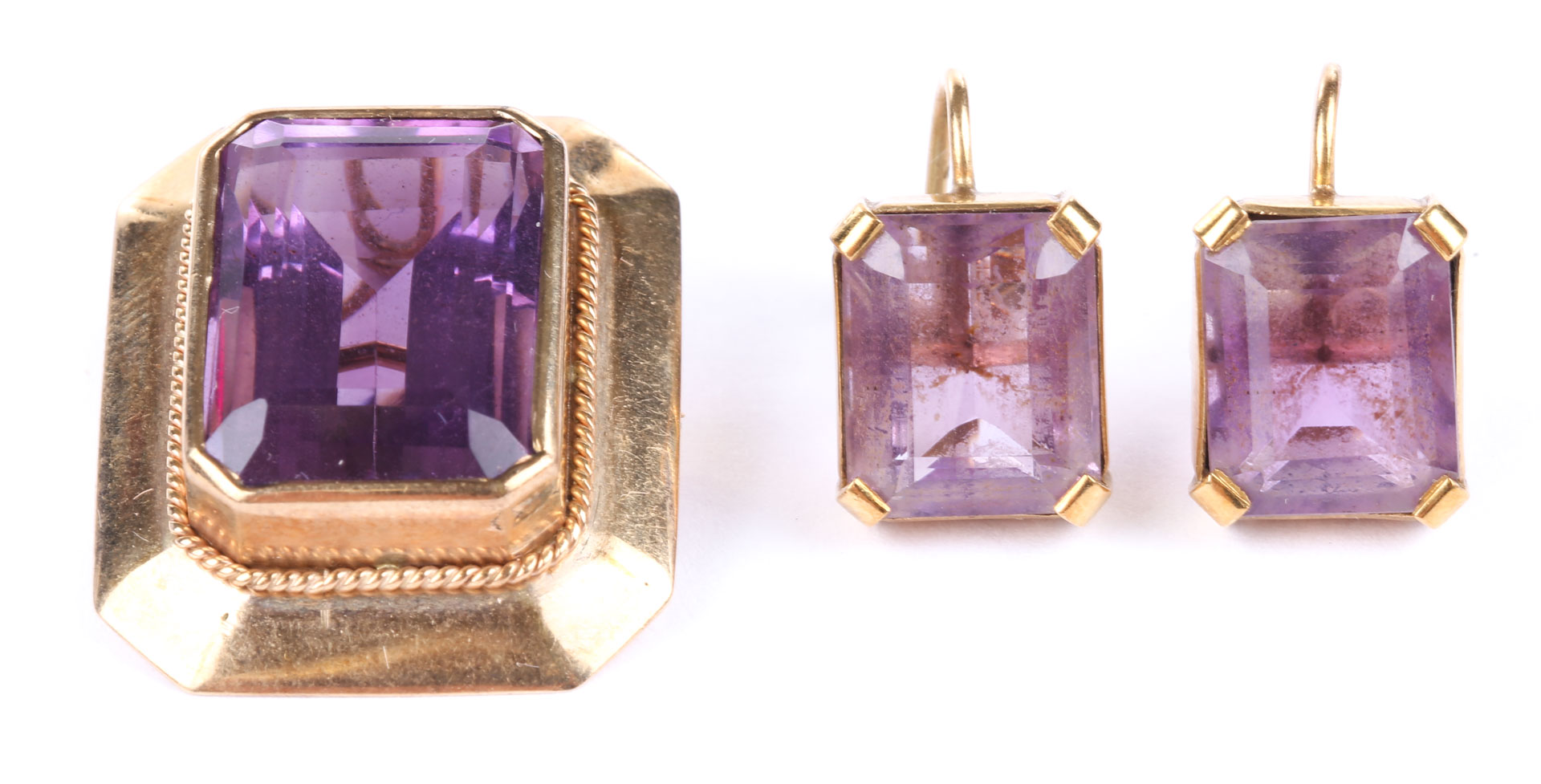 Appraisal: An Amethyst Pendant and Earrings K emerald cut amethyst in