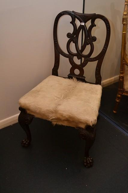 Appraisal: A TH CENTURY CUBAN MAHOGANY CHIPPENDALE CHAIR UPHOLSTERED IN COW