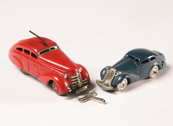 Appraisal: Two vintage Schuco key wind coupes larger car has rubber