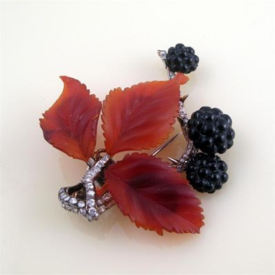 Appraisal: A realistically formed bramble brooch Pav set with circular cut