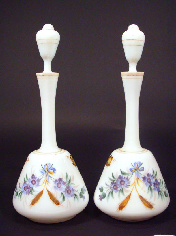 Appraisal: Pair of Victorian white opaline glass bottles and stoppers hand