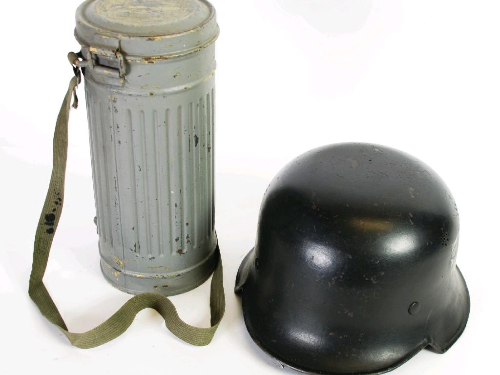 Appraisal: GERMANY THIRD REICH STANDARD FORM MILITARY HELMET with remnants of