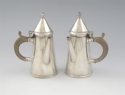 Appraisal: A pair of modern cafe au lait pot by T