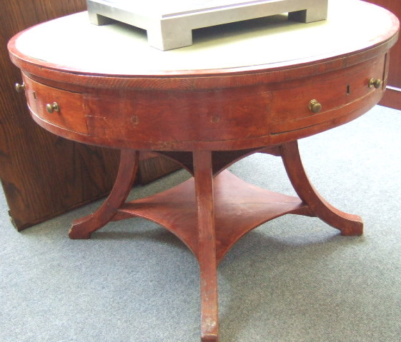 Appraisal: A th century elm drum table the circular top over