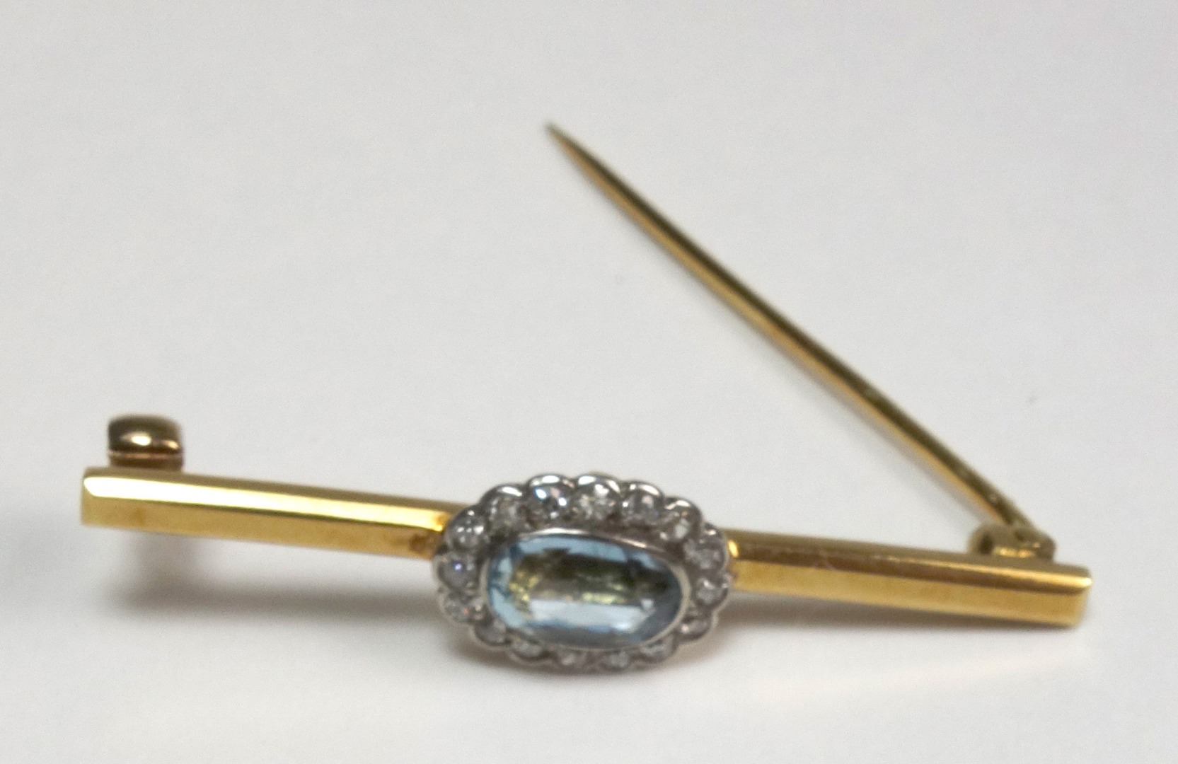 Appraisal: An early th century gold aquamarine and diamond oval cluster