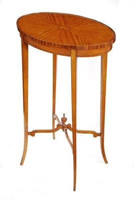 Appraisal: A late th century satinwood oval occasional table the segment