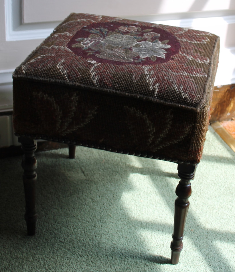 Appraisal: A thC mahogany stool with a square padded woolwork top