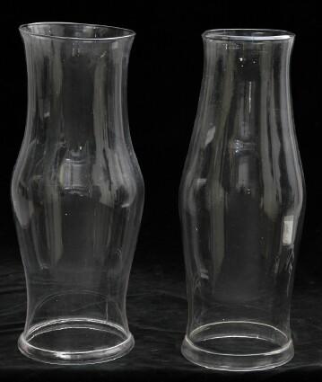 Appraisal: TWO SIMILAR CLEAR GLASS BALUSTER-FORM HURRICANE SHADES Each with fold-over