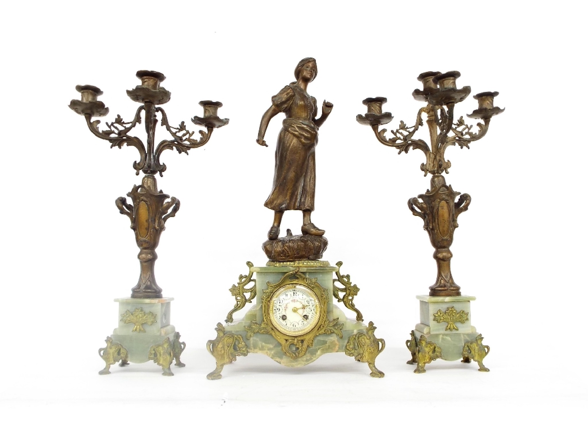 Appraisal: French green onyx and spelter figural two train mantel clock