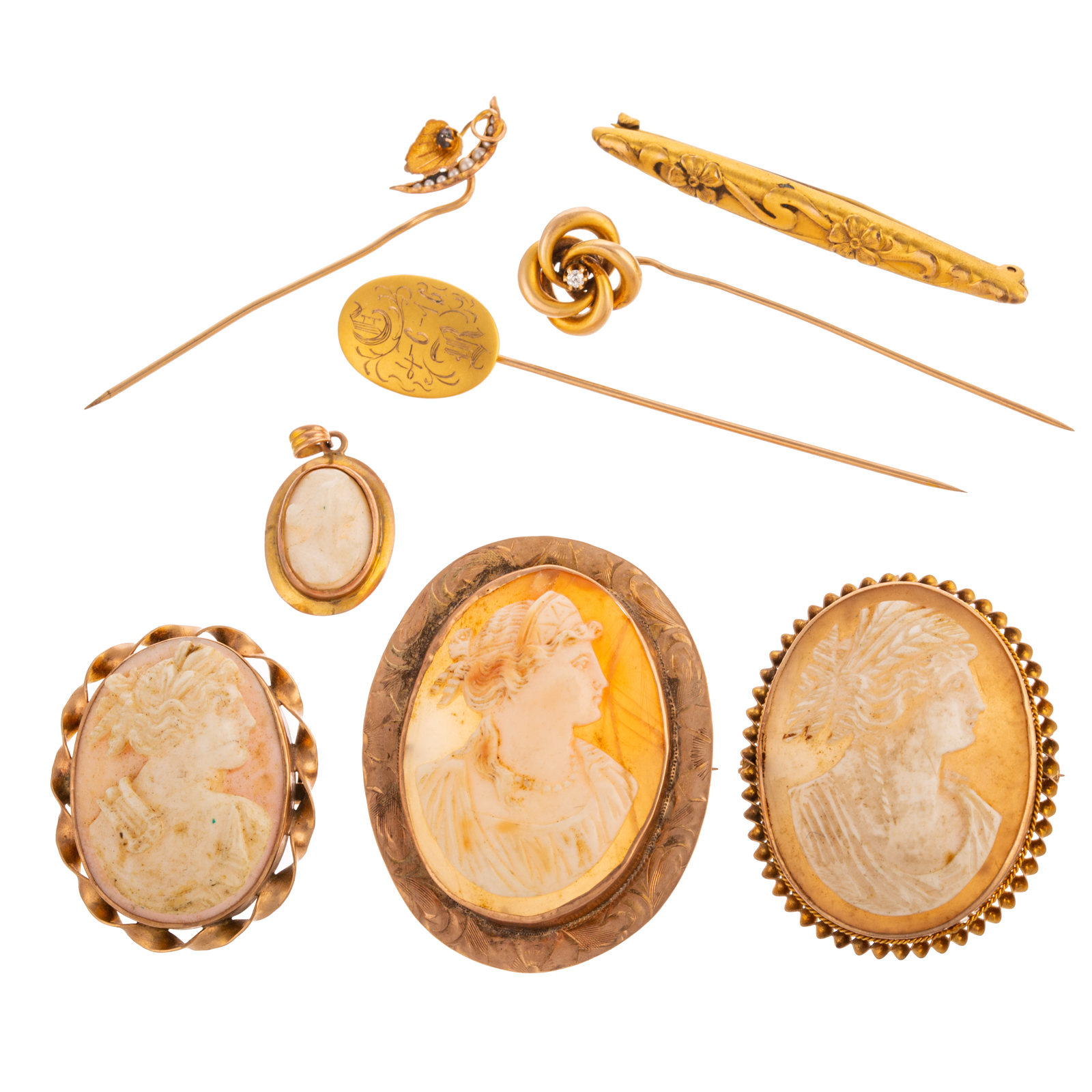 Appraisal: AN ASSORTMENT OF CAMEOS STICK PINS IN GOLD Four K