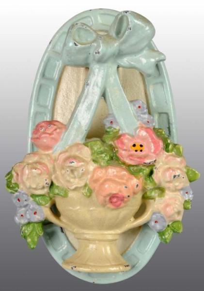 Appraisal: Cast Iron Mixed Flowers in Basket Doorknocker Description Made by