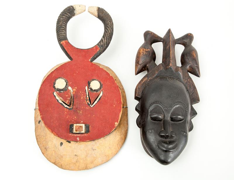 Appraisal: TWO BAULE CARVED WOOD DANCE MASKS The one painted of