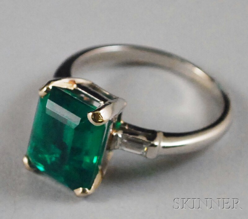 Appraisal: Platinum and Synthetic Emerald Ring with diamond baguette accents emerald