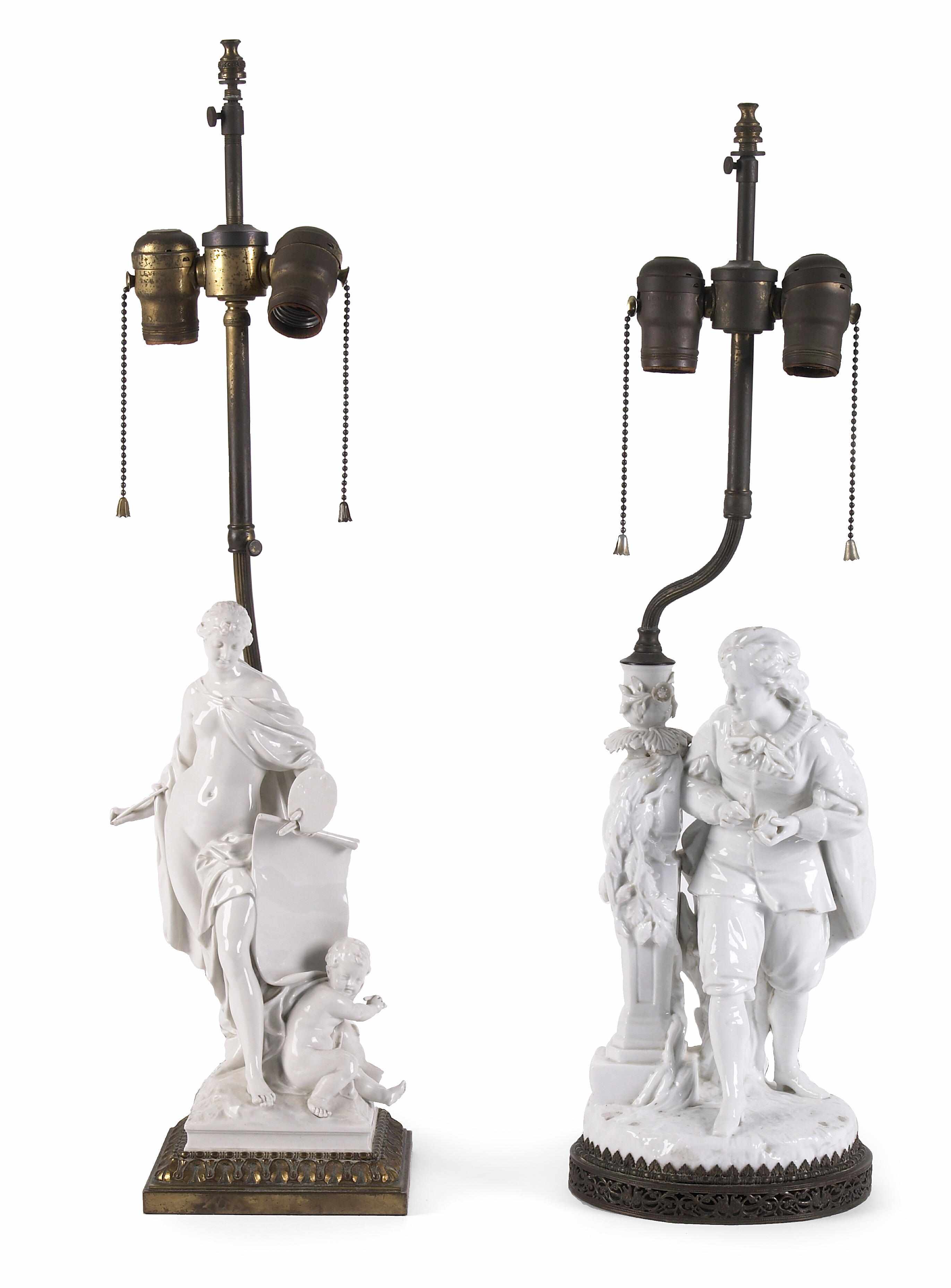 Appraisal: Two glazed bisque porcelain table lamps height to finial of