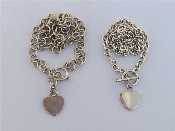 Appraisal: Two Tiffany style silver collars each with heart shaped tags