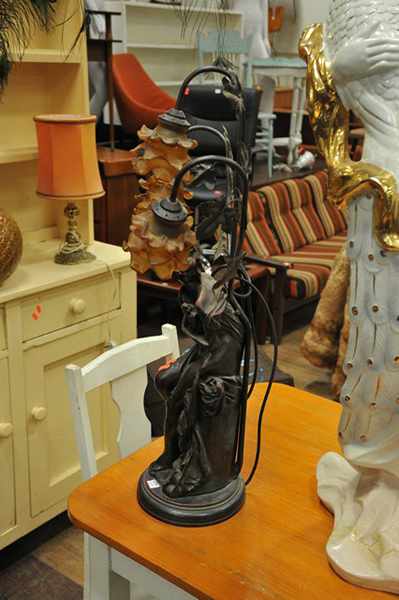 Appraisal: A SPELTER LAMP CAST AS A FEMALE NUDE WITH DOVE