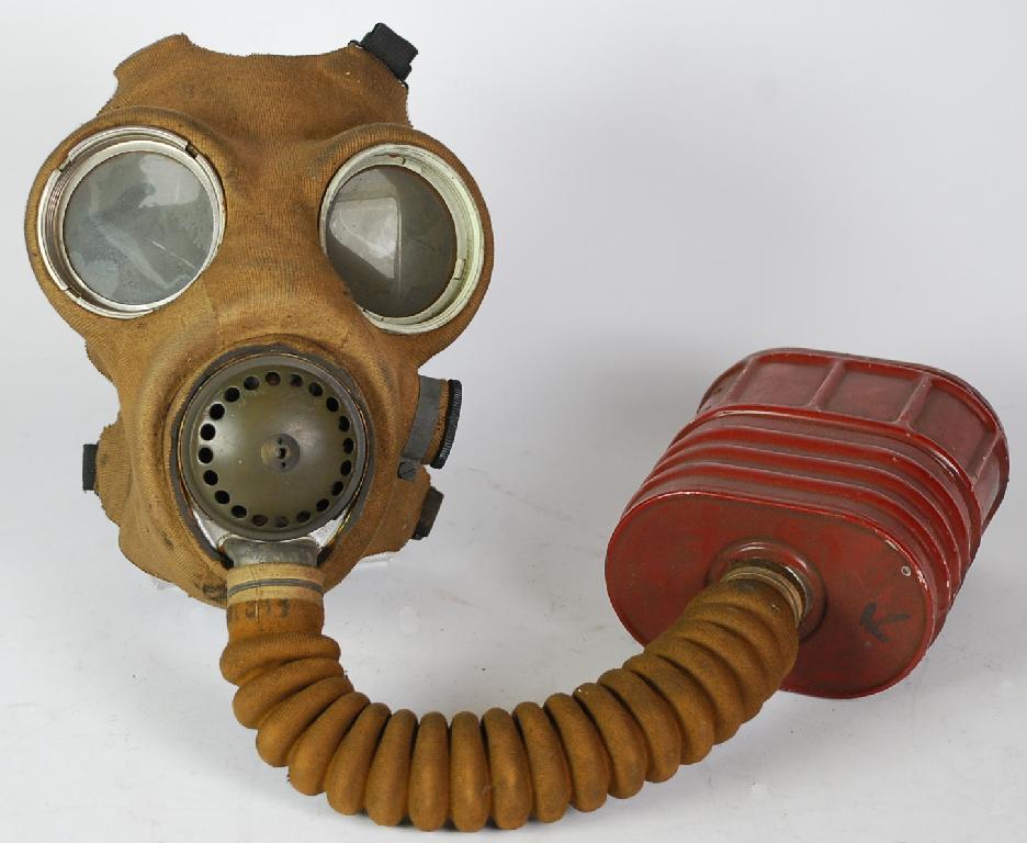 Appraisal: AVON LARGE SIZE WORLD WAR II GAS MASK the khaki