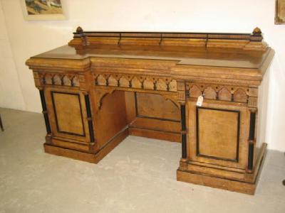 Appraisal: A VICTORIAN POLLARD OAK AND EBONISED PEDESTAL SIDEBOARD the raised