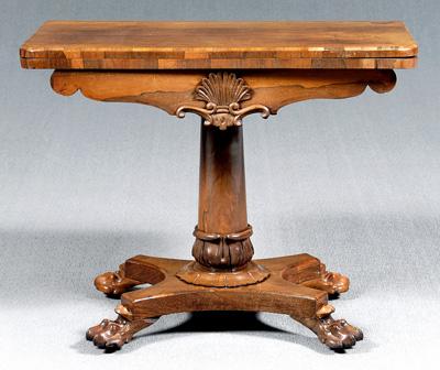 Appraisal: William IV rosewood games table swiveling fold-over top shell-carved skirt