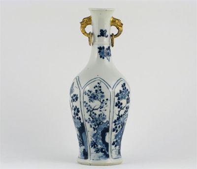 Appraisal: A Chinese blue and white vase moulded with six petal